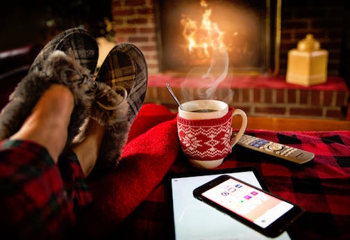 Cozy and comfortable at home by the fire in the winter.