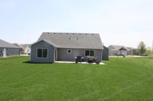 Accessible patio home for sale in St Cloud well manicured large back yard. 