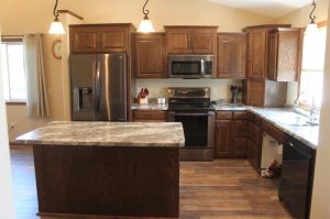 Fully accessibile kitchen with roll under sink and lifeproof flooring. 