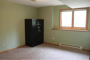 Large Liberty safe in the 3rd bedroom of the home.